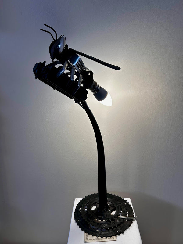 Buzzing Beauty recycled metal bee sculpture lamp by artist Ras from Namibia, eco-friendly art piece at Rogl Souvenirs & Gallery