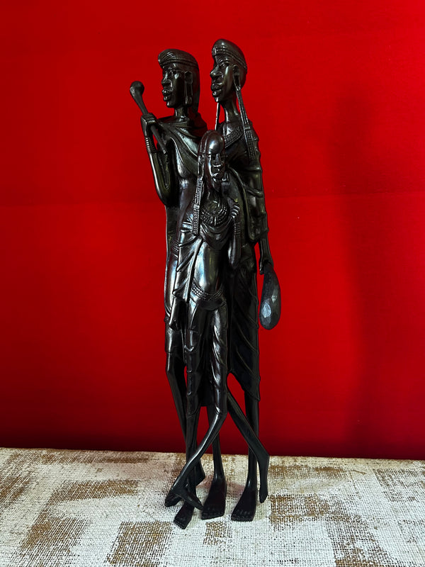 Ebony wood sculpture of Maasai family, handcrafted art from Tanzania, Rogl Souvenirs & Gallery.