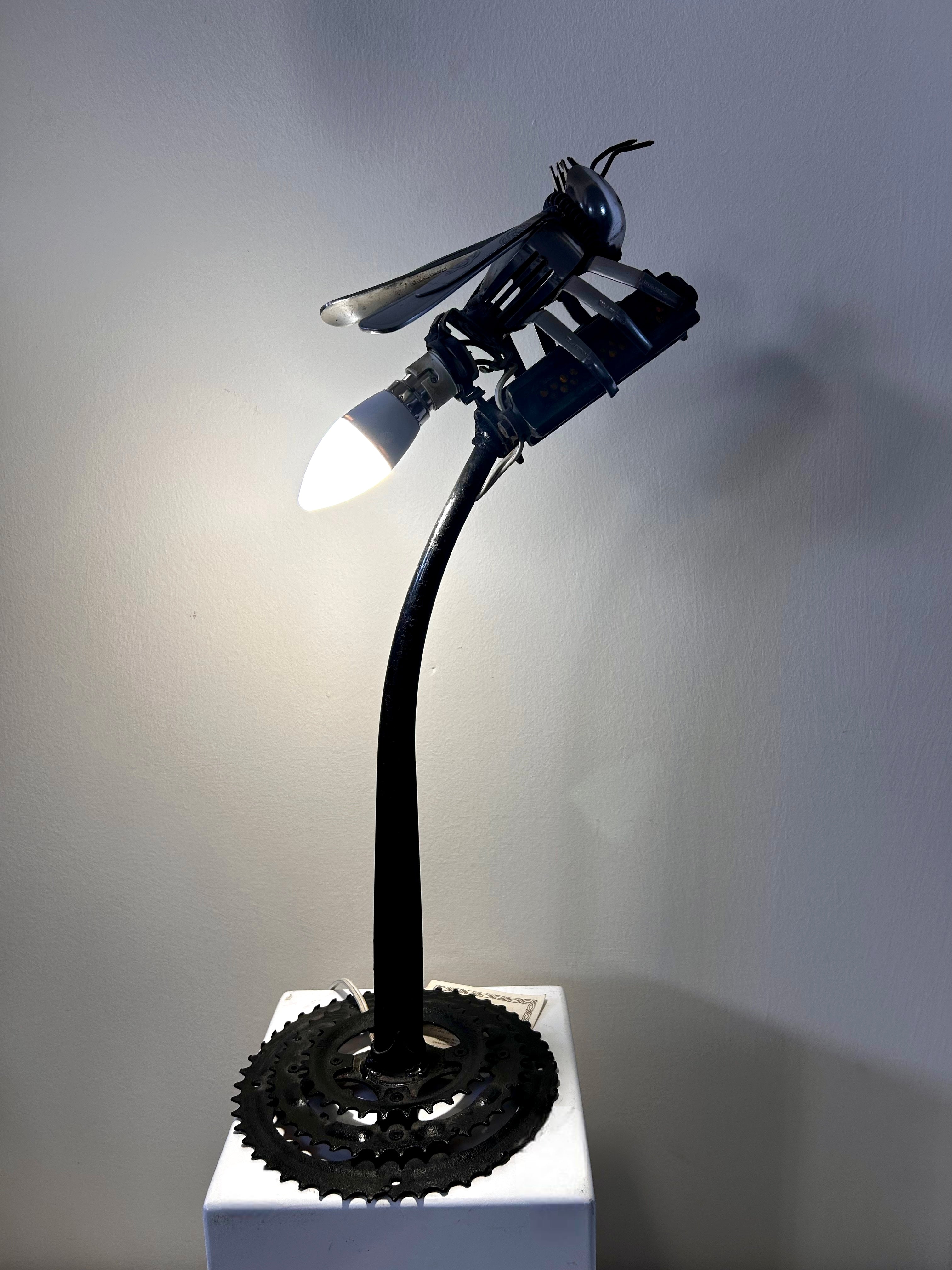 African art sculpture lamp made from recycled materials at Rogl Souvenirs & Gallery