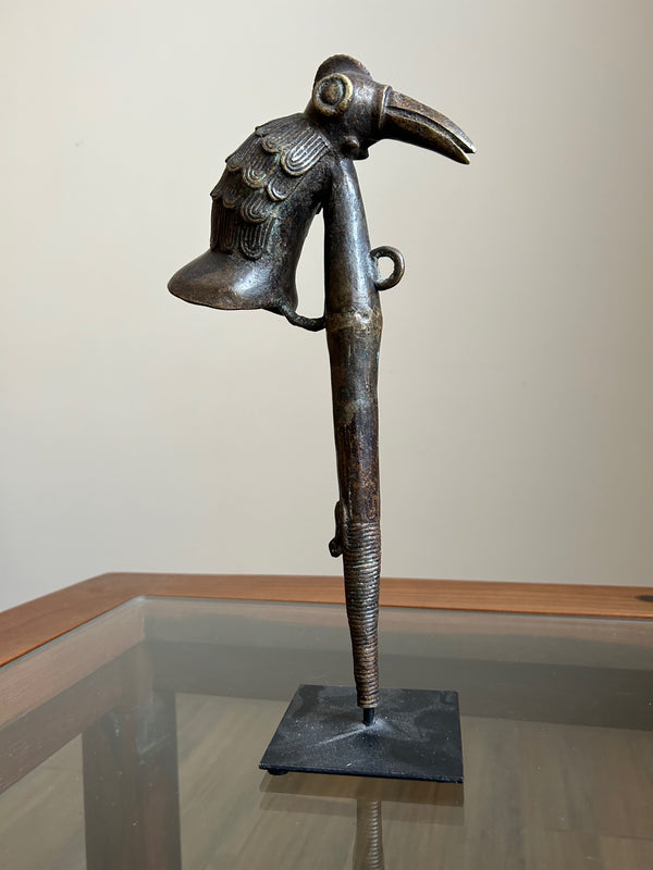 Antique bronze smoking pipe from Bamileke tribe, Cameroon, featuring intricate craftsmanship and patina, displayed at Rogl Souvenirs & Gallery.