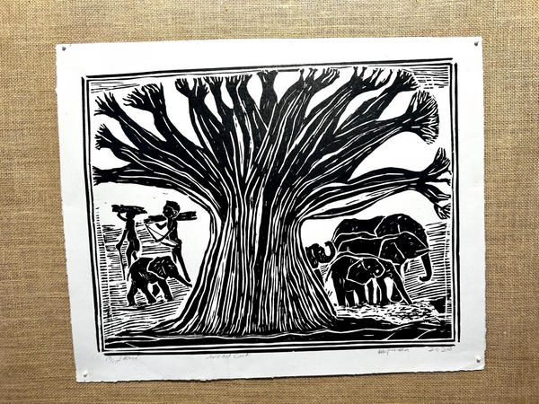 Black and white woodcut artwork of a baobab tree with elephants and villagers, showcasing African cultural symbolism and natural beauty.