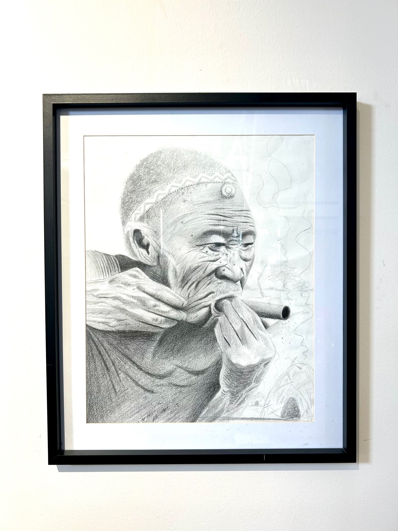 Pencil drawing of an elderly bushman smoking a traditional pipe, titled "Sage Wisdom," showcasing intricate details and cultural significance.