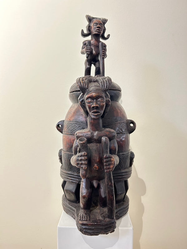Chokwe tribal medicine box from Congo-Zaire with intricate carvings and rich patina, showcasing cultural and spiritual significance.