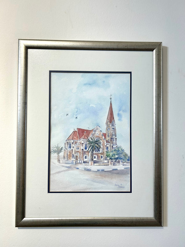 Watercolor painting of Christ Church in Windhoek, Namibia, showcasing architectural details and vibrant earth tones, by artist Davis.