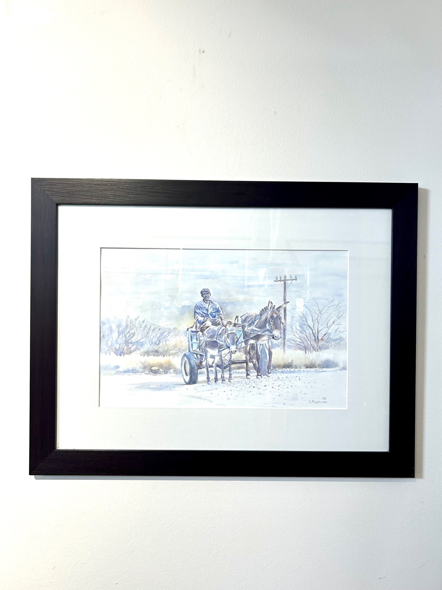 Elderly man riding a donkey cart in rural Namibia watercolor painting, vibrant colors and movement, by artist Davis, landscape orientation, Rogl Souvenirs & Gallery.