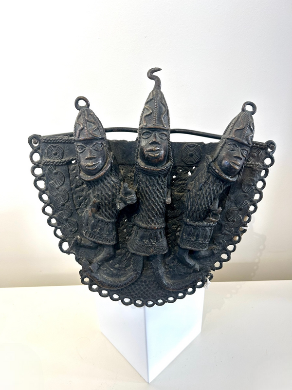 Bronze sculpture of three Ife Tribe royal guardsmen from Benin with detailed patina, displayed at Rogl Souvenirs & Gallery.