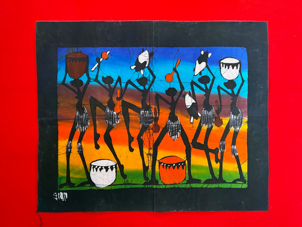 African wax batik art from Mozambique featuring vibrant tribal celebrations in multi-color landscape orientation.