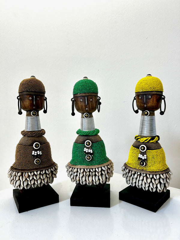 Multi-colour beaded Namji doll set from Cameroon, featuring intricate beadwork and cowrie shells, representing fertility and motherhood in Namji culture.